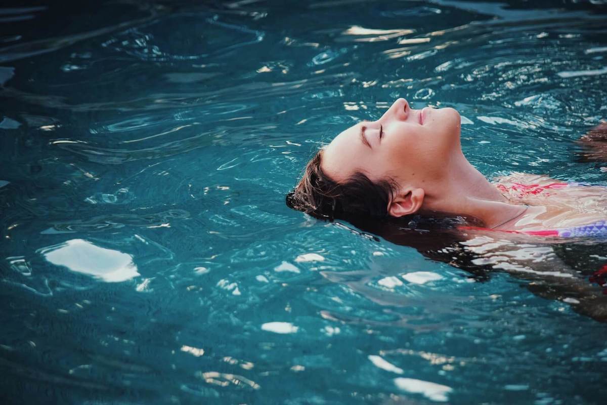 A woman relaxing during float therapy