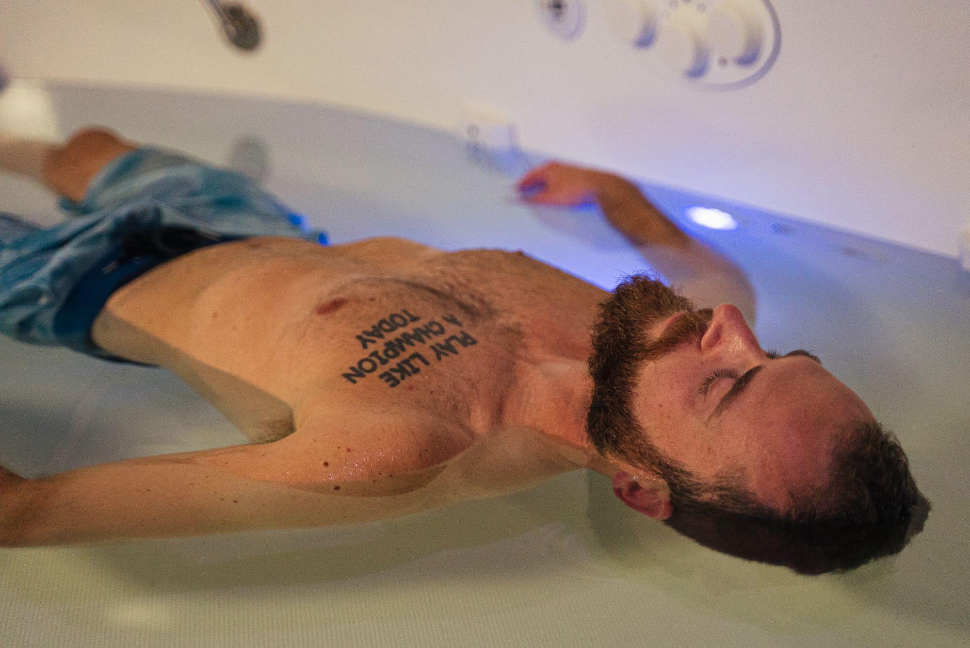 A woman relaxing during float therapy