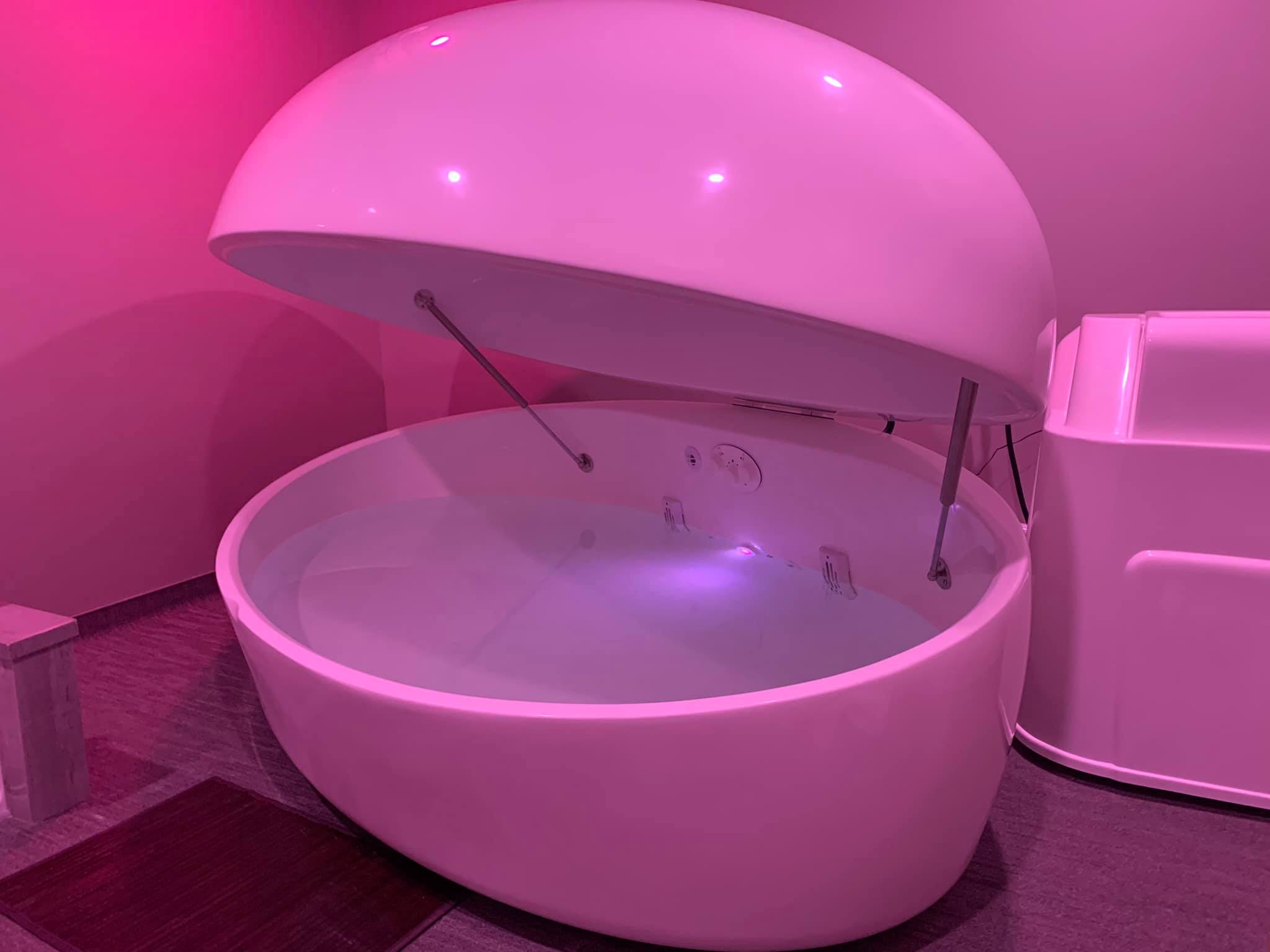 A woman relaxing during float therapy