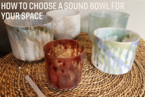 Five sound bowls sitting on a wicker table